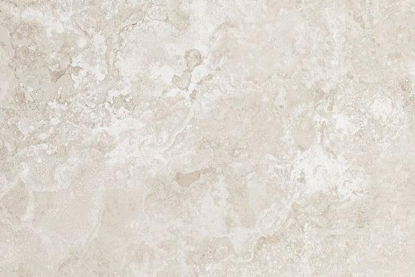 Travertine Crosscut sample – beige natural stone with cloudy cream and pale gray veining, ideal for rustic tabletops