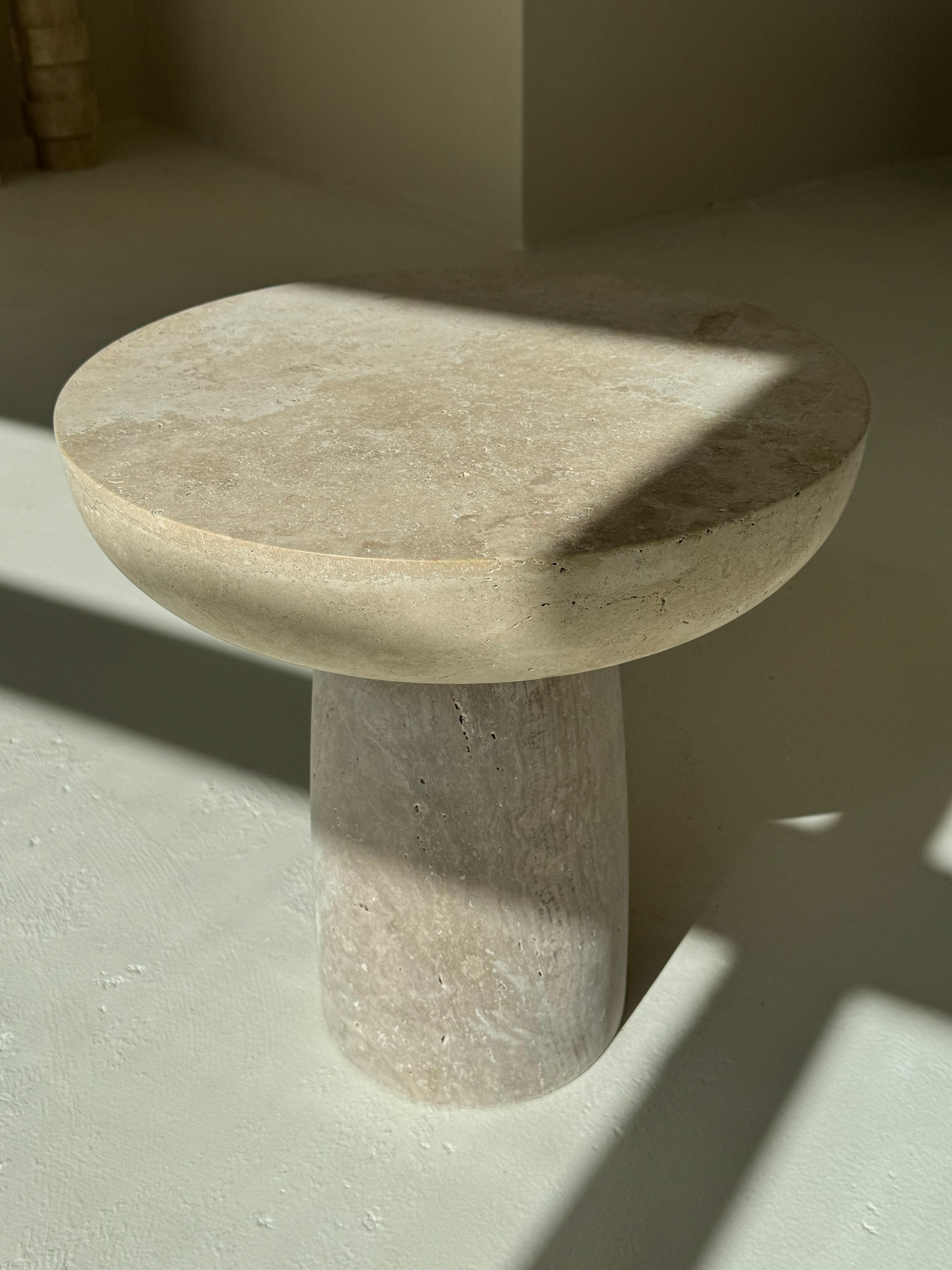 Paddy’s | Travertine Coffee Table set with smooth round tops and block-shaped bases, styled in a neutral modern interior.