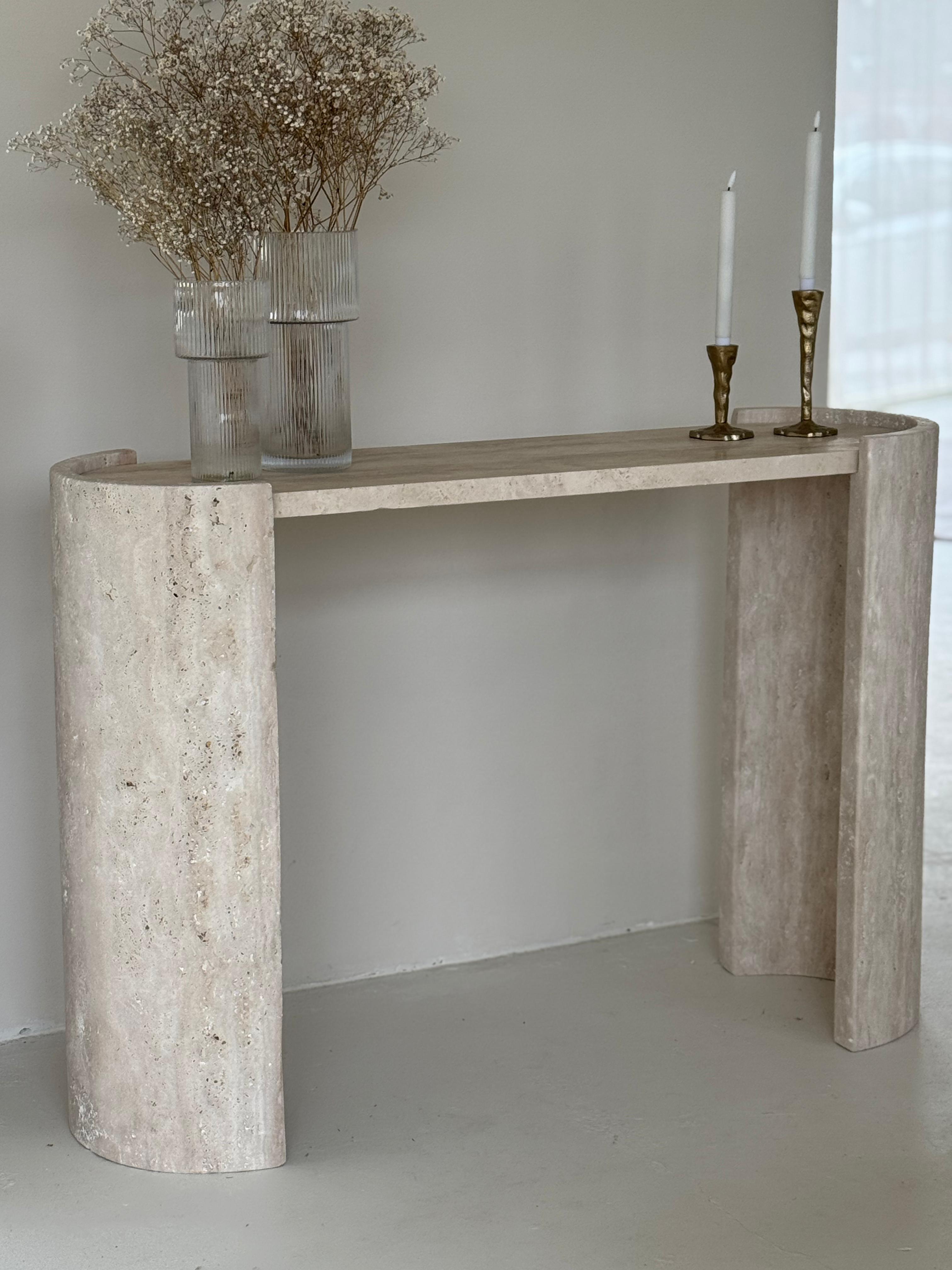 Orchide | Travertine Console Table with rounded legs and honed top, styled in neutral interior
