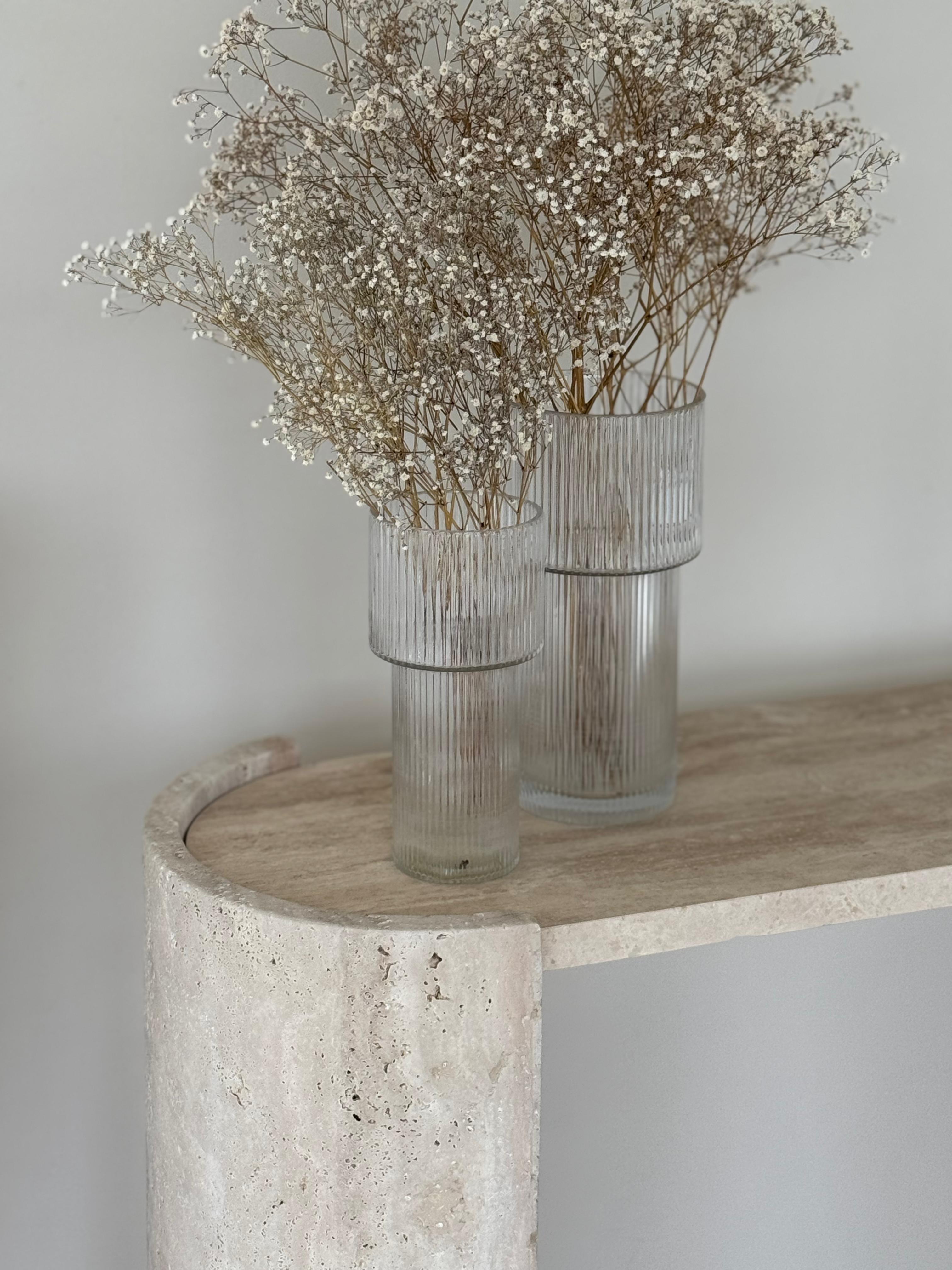 Orchide | Travertine Console Table with rounded legs and honed top, styled in neutral interior