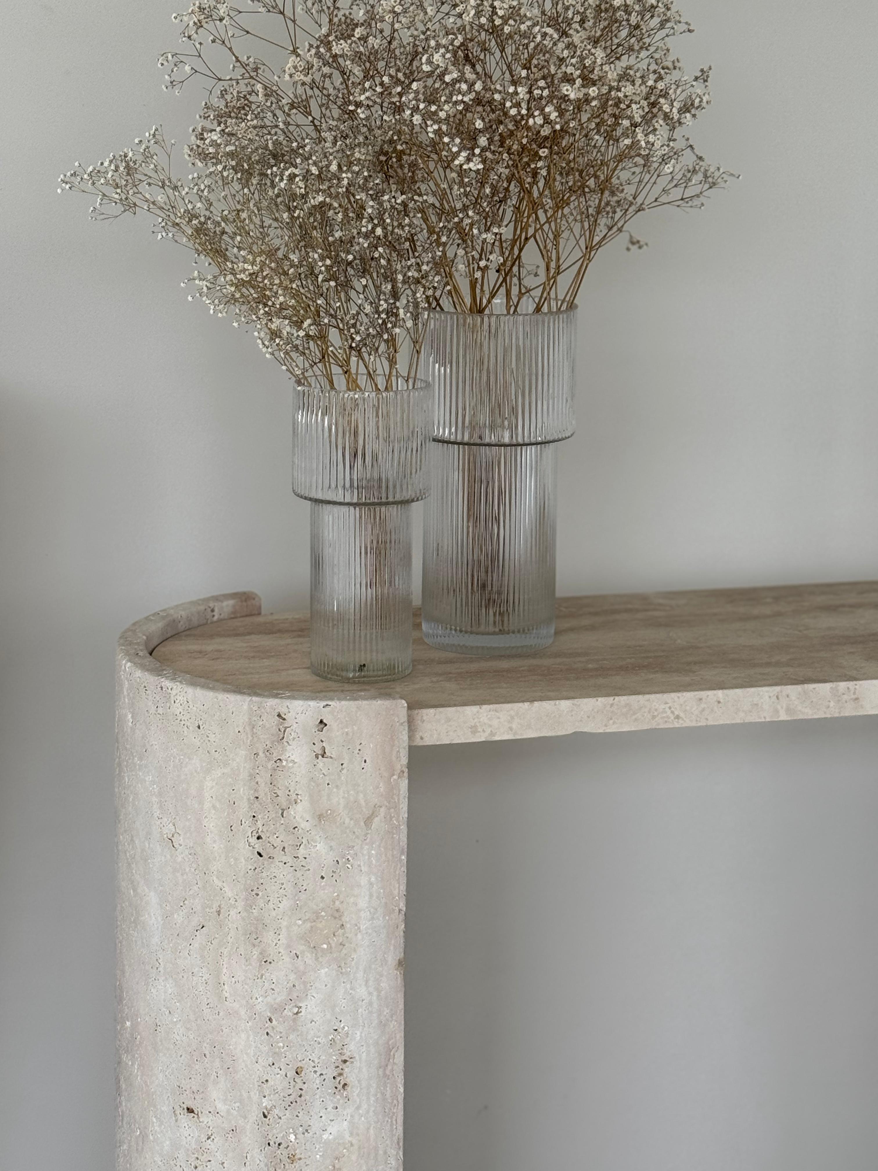 Orchide | Travertine Console Table with rounded legs and honed top, styled in neutral interior