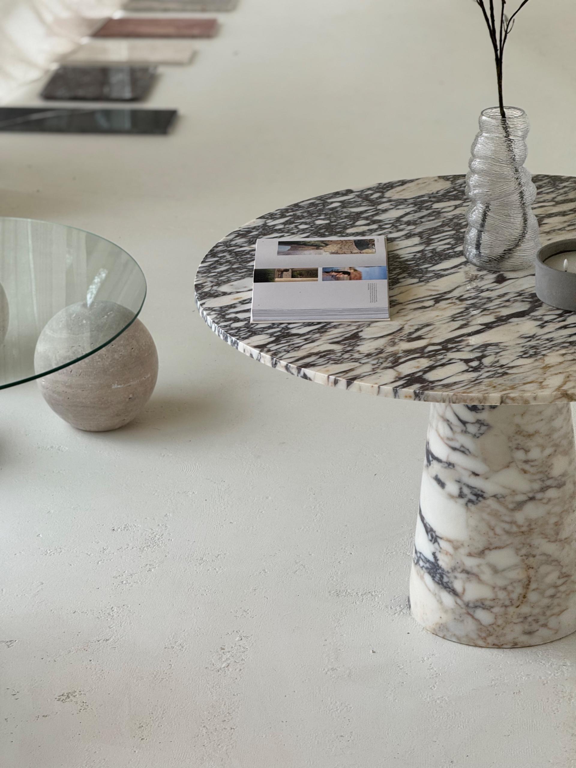 The Conical Violet | Marble Round Dining Table displayed in a minimalist interior