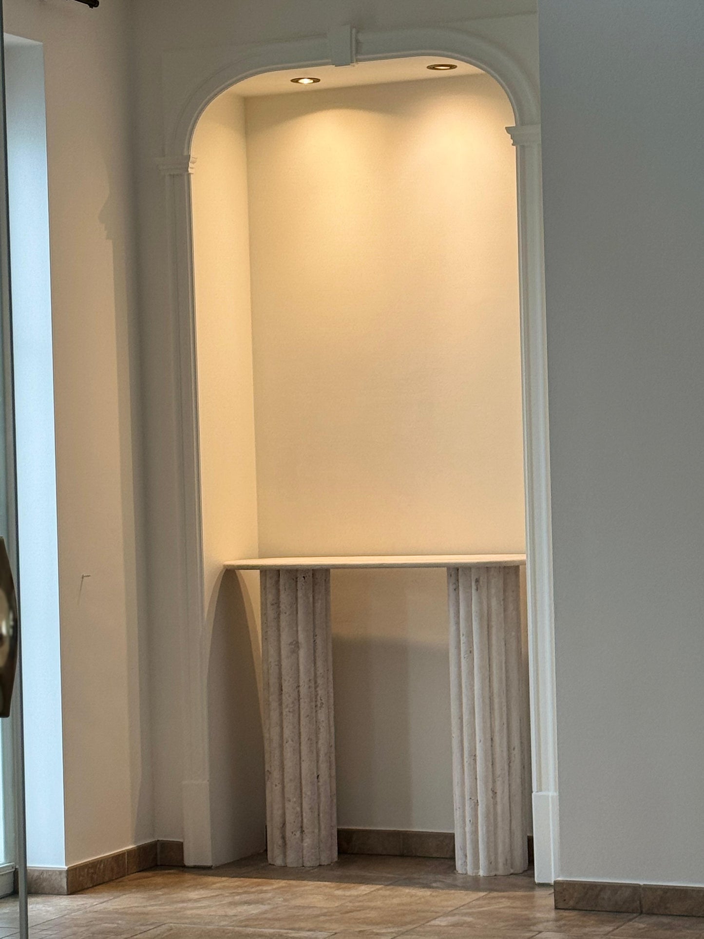 Colosseum travertine console table with fluted cylindrical bases