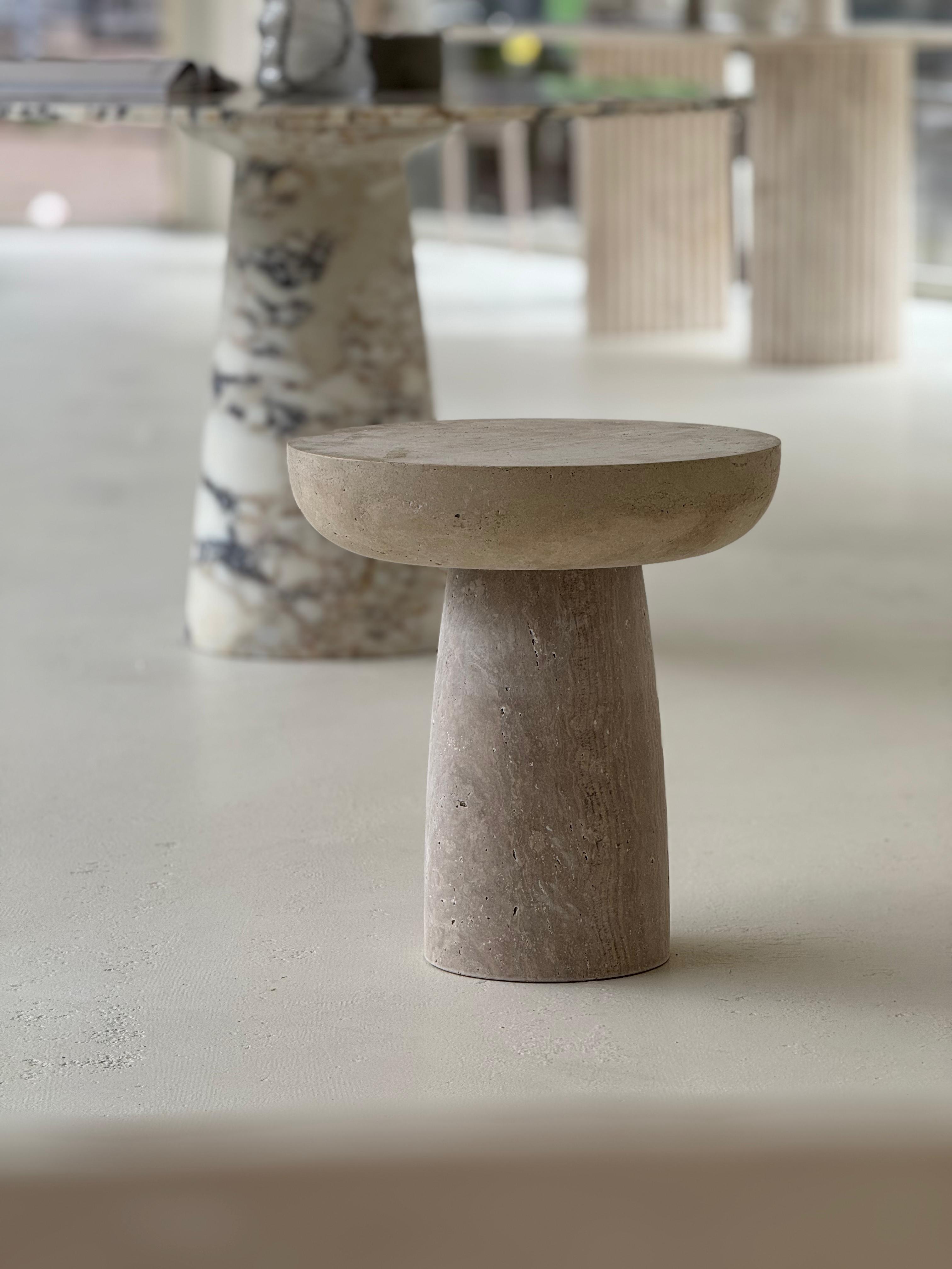 Paddy’s | Travertine Coffee Table set with smooth round tops and block-shaped bases, styled in a neutral modern interior.