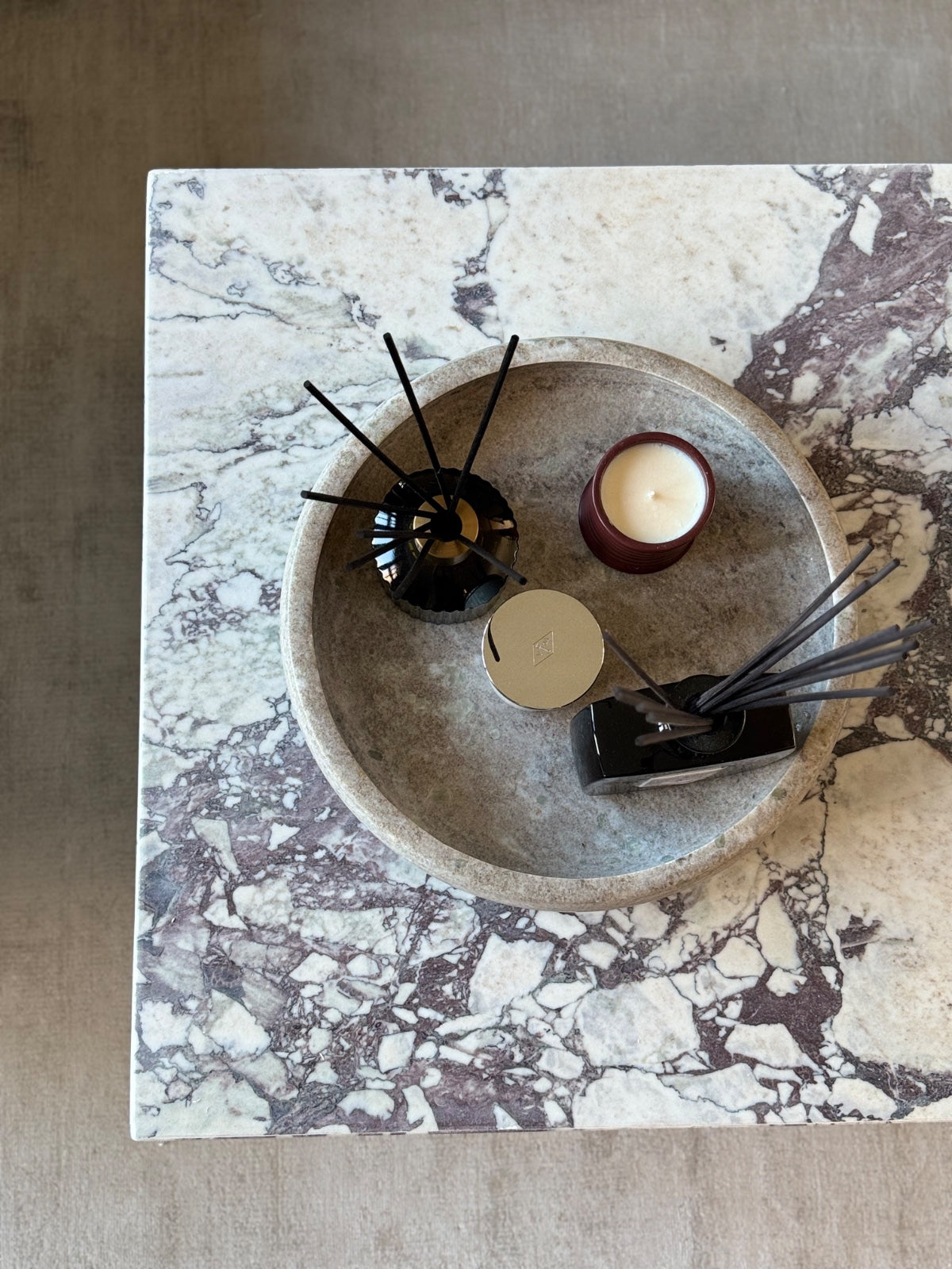 Calacatta Viola solid marble coffee table with bold purple veining, handcrafted by MERAKI MARBLE