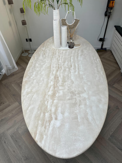 Minimalist interior with Travertine Oval Dining Table | Cone Leg as centerpiece

